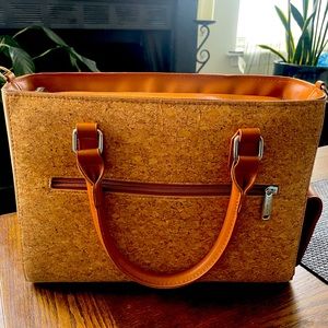 Wine tote/ purse. Never used. Made of cork and lined.